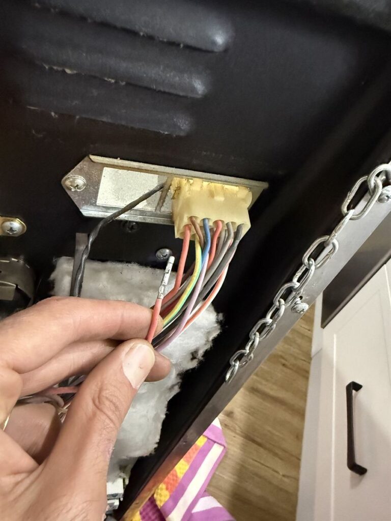 Faulty wiring connection inside the Smeg oven, repaired during the visit